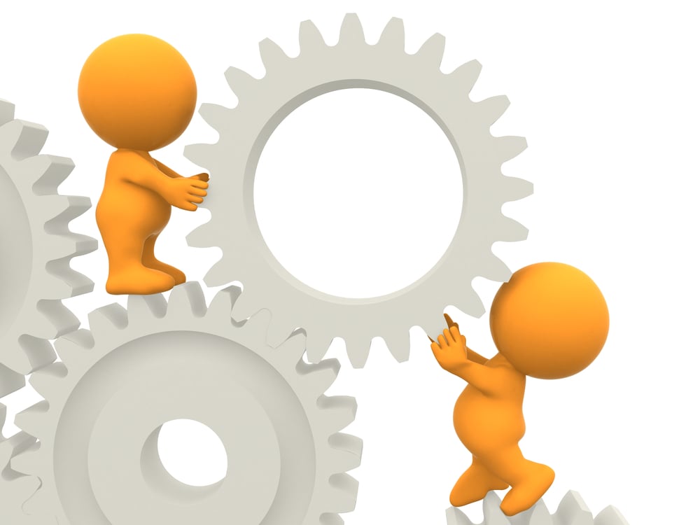3D people assembling gears isolated over a white background