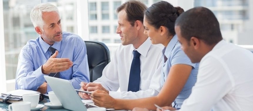 Group of business people brainstorming together in the meeting room-367556-edited-128295-edited